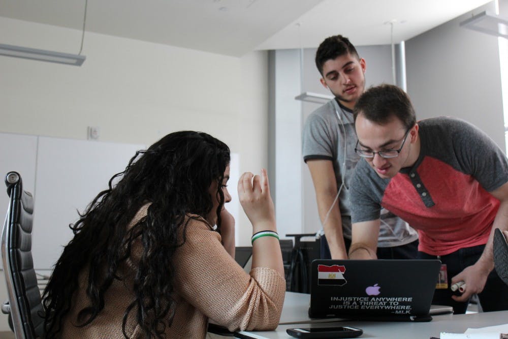 ASU students&nbsp;Hamed Alattar, Dina Elsharkawy and Kinan Moufti plan an event for Students Organize for Syria on Feb. 22, 2017.