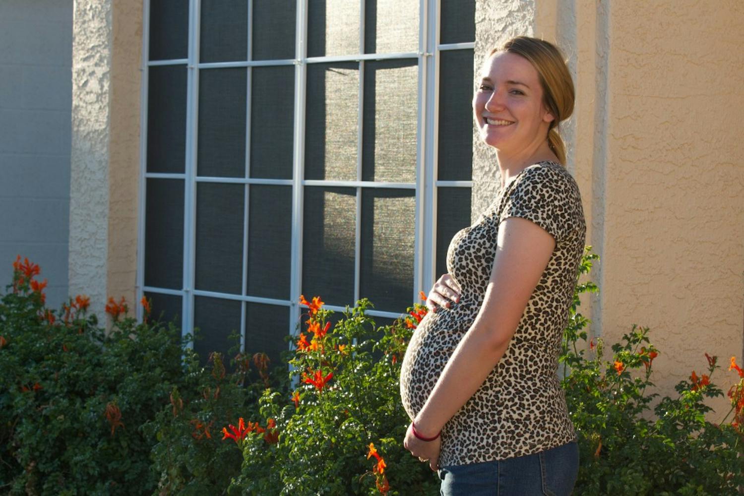 ASU human and family development&nbsp;senior&nbsp;Cassie Mortensen poses for a photo in her eighth month of pregnancy in Chandler, Arizona&nbsp;on Sunday, March 19, 2017.&nbsp;