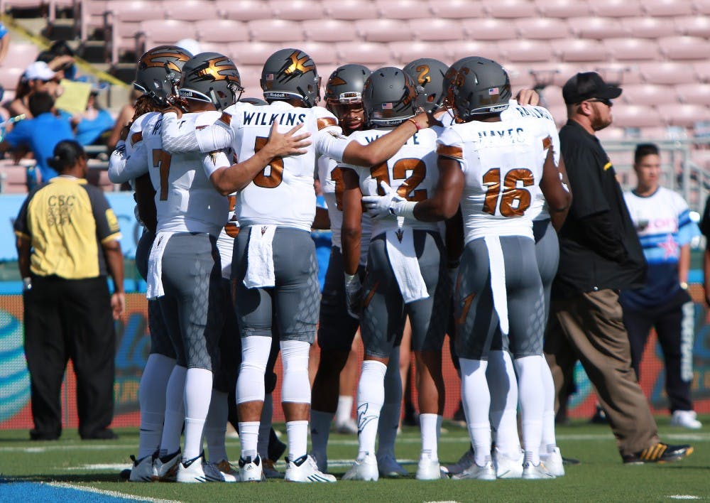 The Sun Devil football team huddles before the game against UCLA on Saturday, Oct. 3, 2015, at Rose Bowl in Pasadena, California. 