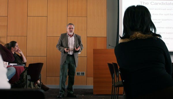 Robert Page, the Dean of the College of Liberal Arts and Sciences, talks to graduate students about how to negotiate your faculty position at the Jumpstarting STEM Careers workshop Saturday afternoon in the Memorial Union. (Photo by Jenn Allen)