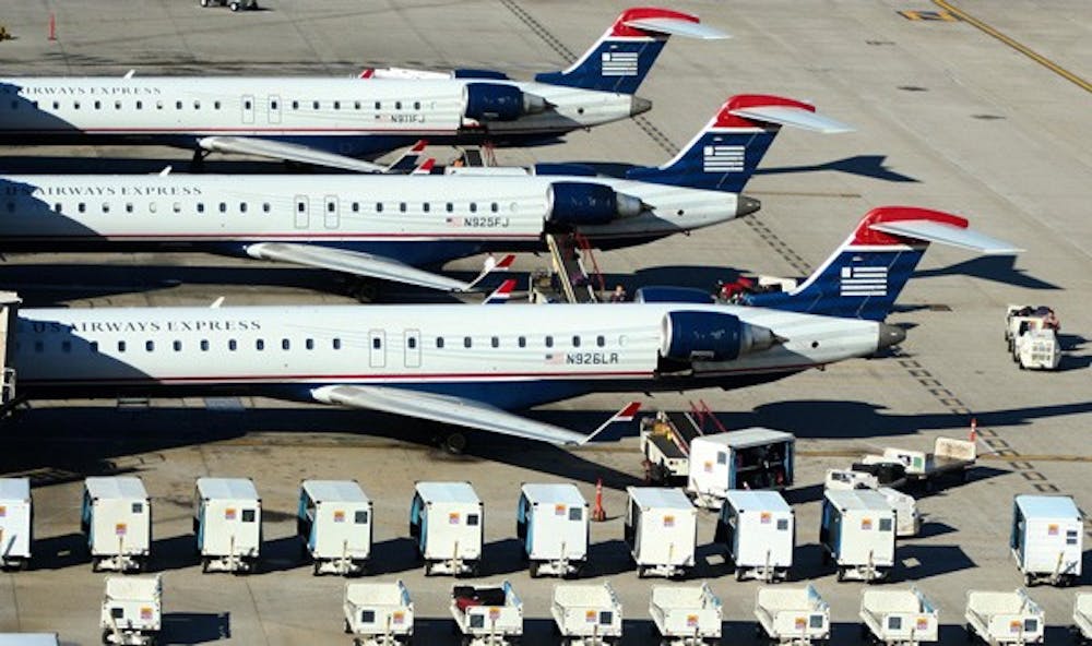 TAKEOFF: Jets line the tarmac at Phoenix Sky Harbor International Airport on Wednesday. The Aerospace and Defense Research Collaboratory will encompass and benefit not only ASU but the surrounding Phoenix area as well. (Photo by Lisa Bartoli)