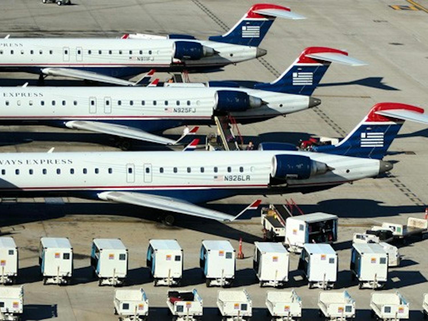 TAKEOFF: Jets line the tarmac at Phoenix Sky Harbor International Airport on Wednesday. The Aerospace and Defense Research Collaboratory will encompass and benefit not only ASU but the surrounding Phoenix area as well. (Photo by Lisa Bartoli)