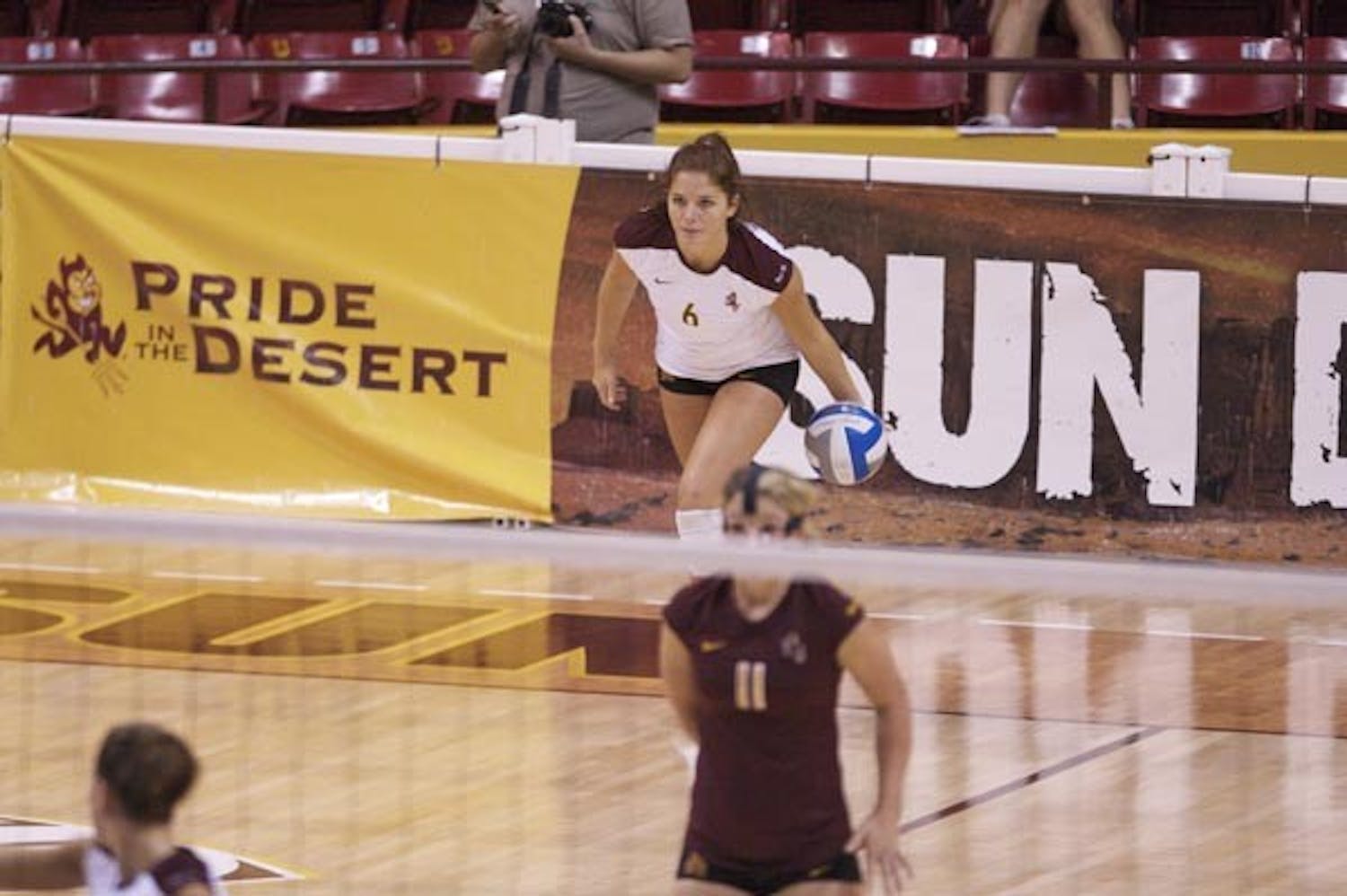 FULL FOCUS: Freshman setter Stephanie Preach prepares to serve during a home match last weekend. ASU lost over the weekend to UA 0-3 in the season opener of the Territorial Cup Series. (Photo by Scott Stuk)
