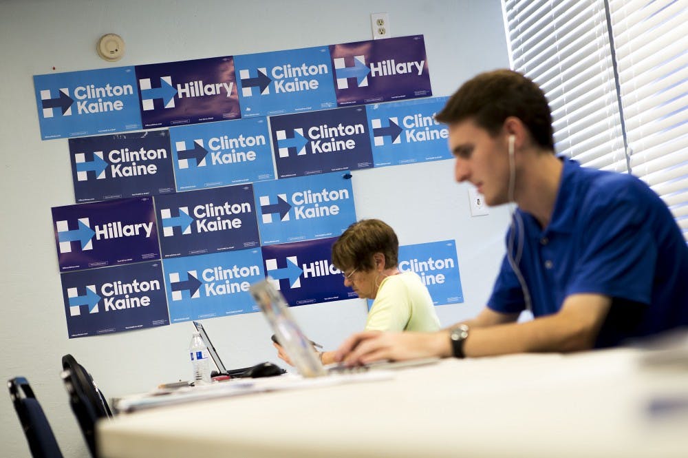 Volunteers participate in a phone bank in the Arizona Democratic headquarters in Downtown Phoenix, on Sept. 29, 2016.