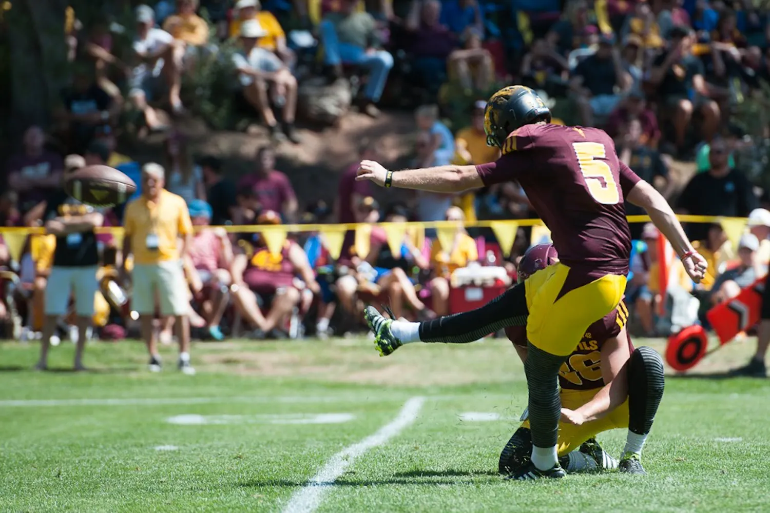 Junior kicker Zane Gonzalez kicks an extra point during the last day of Camp Tontozona on Saturday, Aug. 15, 2015, in Payson, Arizona.