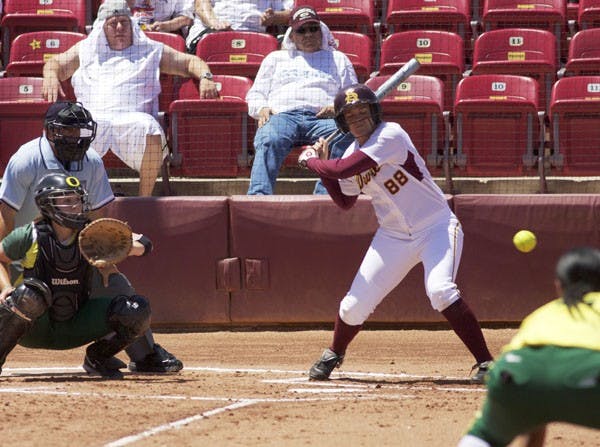 TO SWING OR NOT TO SWING: Sophomore right fielder Annie Lockwood eyes a pitch during the Sun Devils’ 3-0 win over Oregon on Sunday at Farrington Stadium. ASU won two of three games over the weekend. (Photo by Scott Stuk)