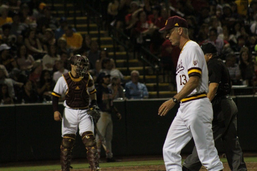 Head Coach Tracy Smith walks back to the dugout after making a pitching change&nbsp;during a baseball game against the Arizona Wildcats at Phoenix Municipal Stadium in Phoenix, Arizona on Saturday, May 20, 2017. ASU lost 5-9