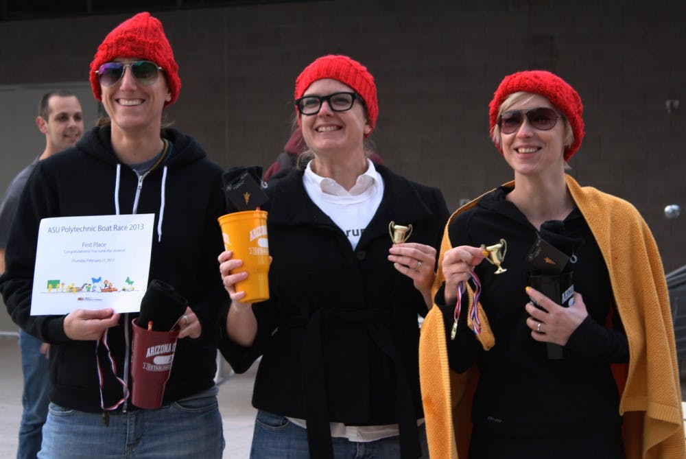 Architektons pose with their trophies after taking first place at the First Annual Boat Race at the Polytechnic Campus. (Photo by Jessie  Wardarski)