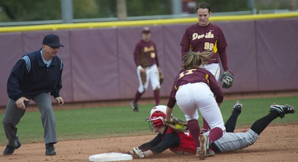 FIGHTING THROUGH: Sophomore shortstop Katelyn Boyd (broken fingers) is among the numerous SU softball players who have played through injuries during the 2010 season. (Photo by Michael Arellano)