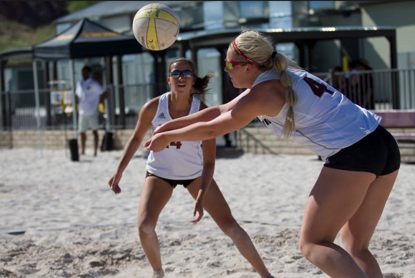 ASU senior Cassidy Pickrell (4) bumps a ball during a beach volleyball match against the University of California Golden Bears at PERA Club in Tempe, Arizona on Friday, April 21, 2017.