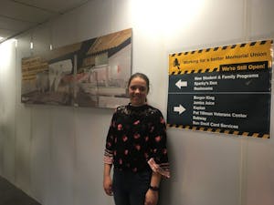 Junior Hannah&nbsp;Mackellar&nbsp;outside the lower level construction in the MU on&nbsp;Feb. 18. She&nbsp;said while the&nbsp;construction could improve the MU, the bowling alley will be missed.&nbsp;