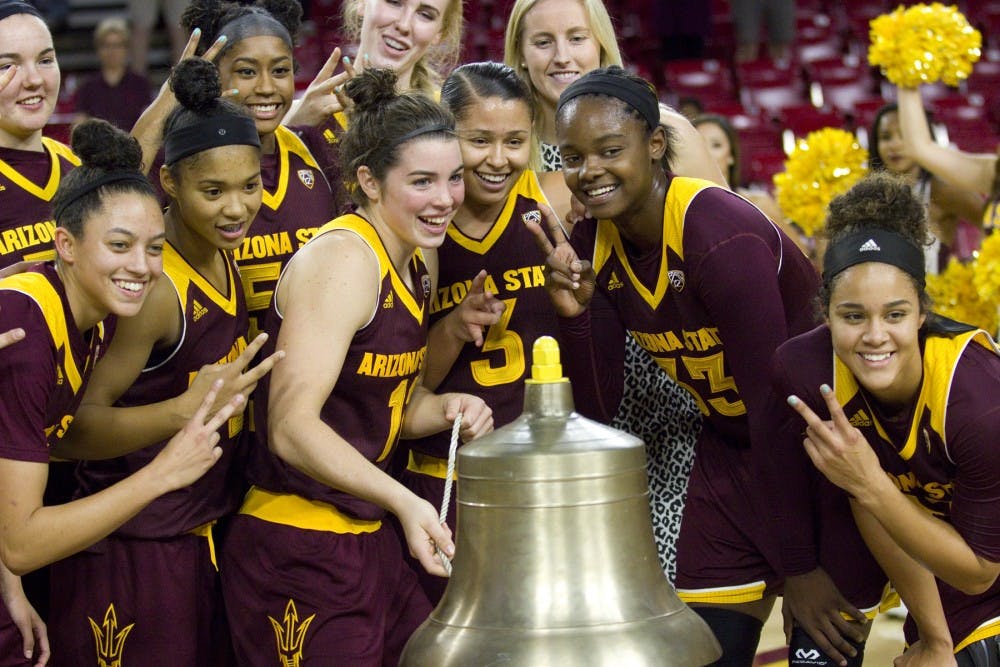 The ASU women's basketball team rings the victory bell after a 82-37 victory over the San Jose State Spartans in Wells Fargo Arena in Tempe, Arizona, on Sunday, Nov. 13, 2016.