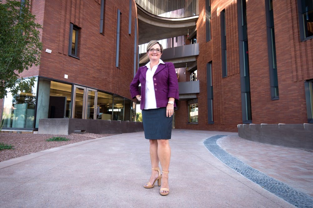 Dean Amy Hillman poses for a portrait outside of the W. P. Carey School of Business. 