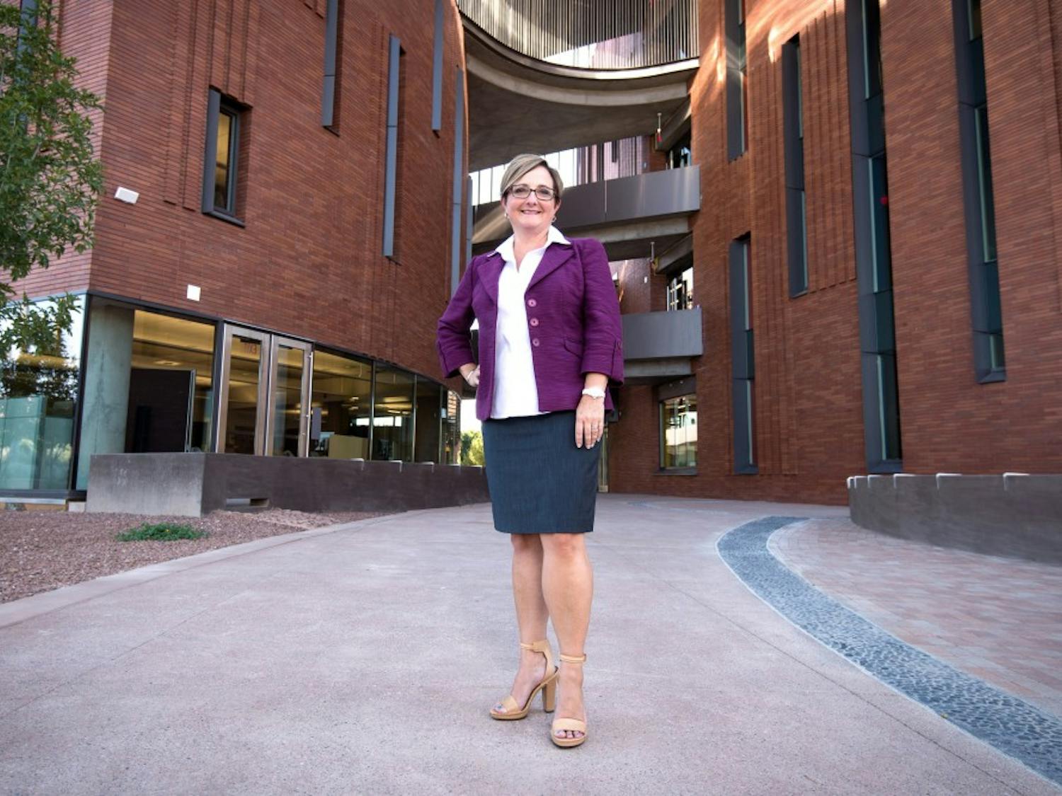 Dean Amy Hillman poses for a portrait outside of the W. P. Carey School of Business. 