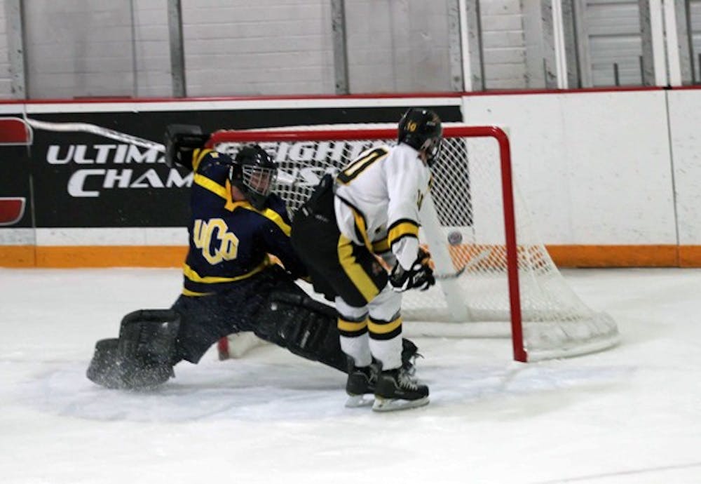 PULLING EVEN: ASU forward David Jantzie scores a backhand goal against Central Oklahoma on Saturday. The Sun Devils avoided a weekend sweep with a 7-3 win on Saturday night. (Photo by Lisa Bartoli)