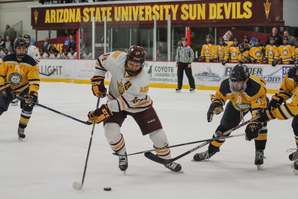 ASU's Anthony Croston, 18, breaks through a line of Southern New Hampshire players during the hockey game versus Southern New Hampshire in Tempe, Arizona on Saturday, Jan. 21, 2017. ASU won 4-1.