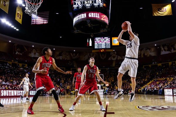 Senior guard Bo Barnes nails a jumper late in the second half at the ASU vs UNLV game on Dec. 3rd, 2014 at the Wells Fargo Arena. Barnes's 11 points would help the Sun Devils to a 77-55 victory over the Runnin Rebels. (Photo by Daniel Kwon)