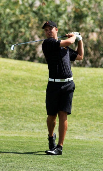 Sophomore Mathias Schjoelberg watches his ball land after hitting from the fairway during the ASU Thunderbird Invitational last April. (Photo by Sam Rosenbaum)