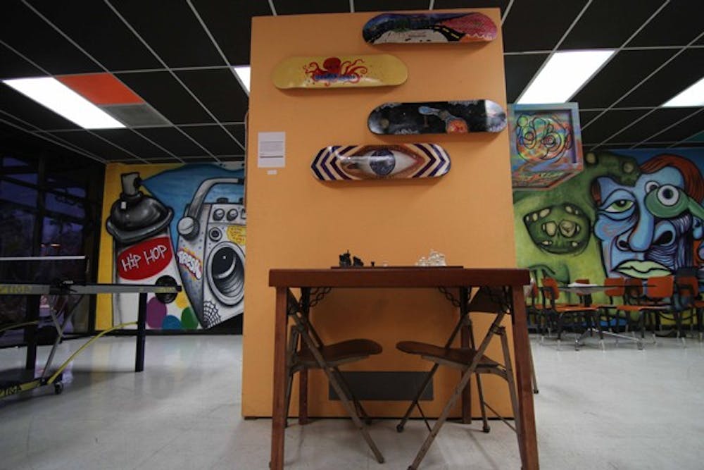 STUDENT SPOT: The Open Source Project Cafe on University Drive and Dorsey Lane is a new alternative coffee house full of art, game systems and a ping pong table catering to ASU students. (Photo by Lisa Bartoli) 