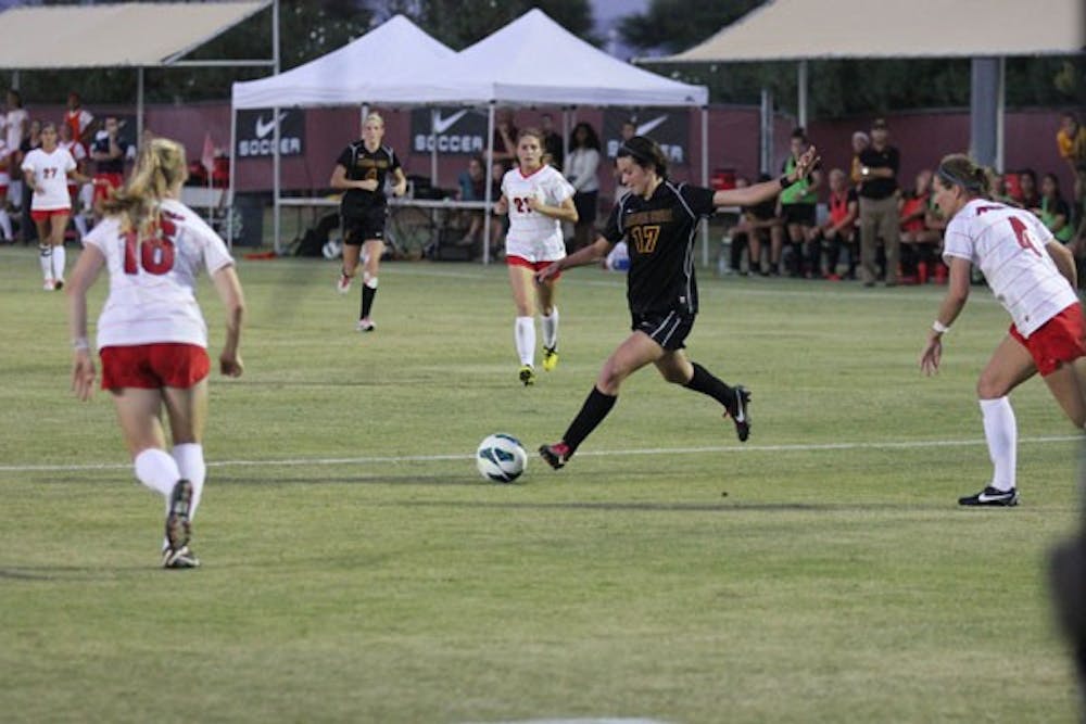 Freshman forward Cali Farquharson gets set to kick the ball away during the Sun Devils’ 4-1 win over Utah on Oct. 25. (Photo by Kyle Newman)