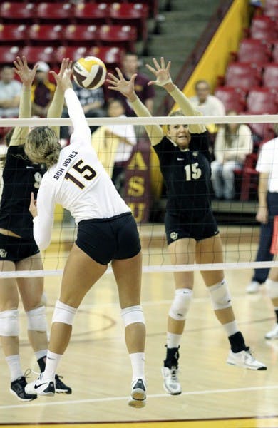 FIRST SWEEP: ASU redshirt sophomore Ashley Kastl spikes the ball against her opposite number during the Sun Devils’ win over Colorado on Friday. ASU defeated both Pac-12 foes over the weekend for the first time this season. (Photo by Samuel Rosenbaum)