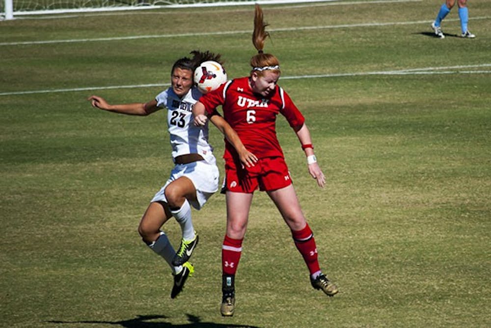 Freshman defender Larisa Staub heads the ball at a home game in Tempe against Utah. The Sun Devils won despite trailing Utah for most of the game. (Photo by Murphy Bannerman)