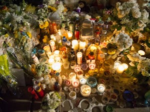 Candles, flowers, stuffed animals and assorted favorite foods of ASU Student&nbsp;Yue Jiang&nbsp;are seen on Tuesday, Jan. 19, 2016,&nbsp;in Tempe&nbsp;at the impromptu memorial set up by friends, fellow students and Tempe's Chinese-American community just East of the Broadway and McClintock intersection where a case of road rage is blamed for the young woman's death.