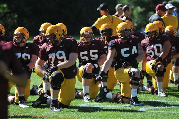 ASU football players stretch before practice of the second day of Camp Tontozona. (Photo by Andrew Ybanez)