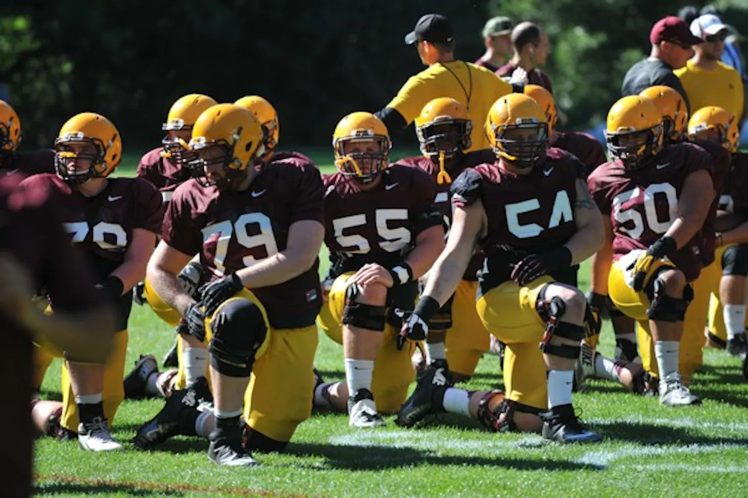 ASU football players stretch before practice of the second day of Camp Tontozona. (Photo by Andrew Ybanez)