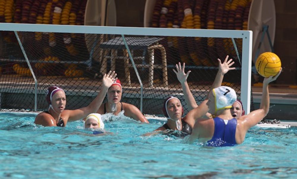 Starting at the Bottom: (from left) ASU junior Nikki Unbehaun, freshman goalie Ianeta Hutchinson and junior Mariam Salloum fend off a UCLA attack on March 5 in Tempe. The Sun Devils are preparing for the conference championships, where they will be the lowest seed. (Photo by Beth Easterbrook)