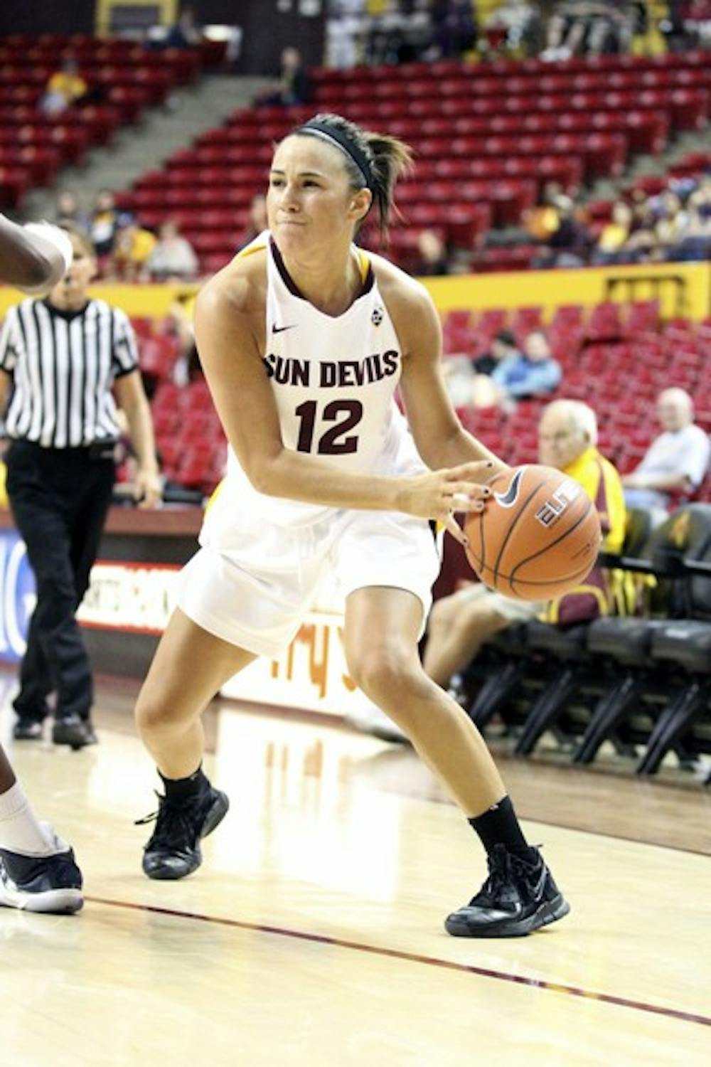 EAGLES HAVE LANDED: ASU senior guard Alex Earl looks for a pass inside against UC Riverside in Nov. 11. The Sun Devils welcome Boston College to Wells Fargo Arena with a 3-0 start in their sights. (Photo by Samuel Rosenbaum)