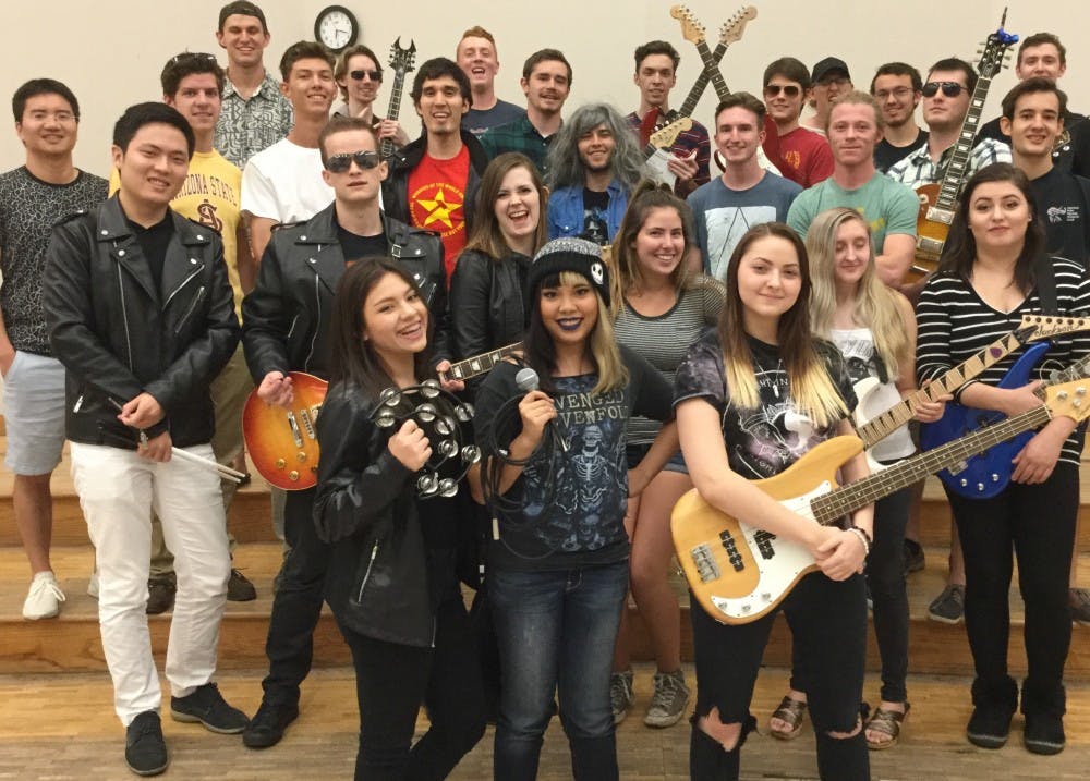 Students in the ASU Rock Band class pose for a flyer announcing an upcoming concert. The end-of-semester show will include both old and new styles of rock.