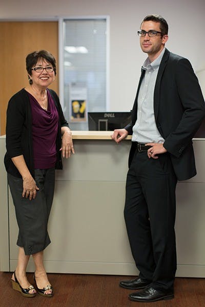 Katie Aguilar (left) and Adam Brown are part of the team from the United Way partnering with ASU to hold a fundraising campaign. (Photo by Ryan Liu)
