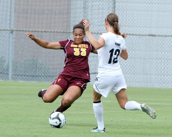 NOT ENOUGH: ASU junior defender Sierra Joseph goes in for the tackle against Old Dominion senior Lisa Bernardini during the Sun Devils’ 3-1 loss on Sunday. ASU’s main goal is recovering its high-scoring form against Mizzou and Oklahoma. (Photo courtesy of Steve Rodriguez)