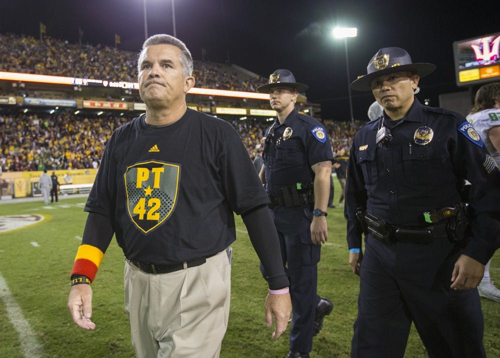 ASU coach Todd Graham walks off the field after a loss on Thursday, Oct. 29, 2015, at Sun Devil Stadium in Tempe, Ariz. The Ducks beat the Sun Devils 61-55 in the third overtime period. 