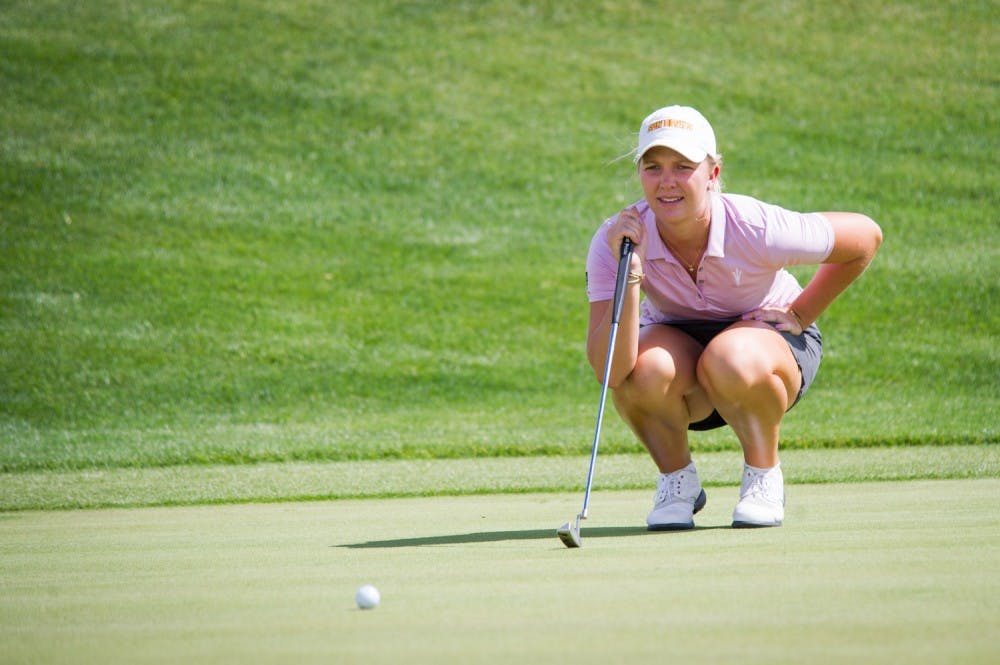 Freshman Linnea Strom assesses her putt on the ninth hole on Friday, April 8, 2016 during the 2016 Ping ASU Invitational at Karsten Golf Course in Tempe, Arizona.