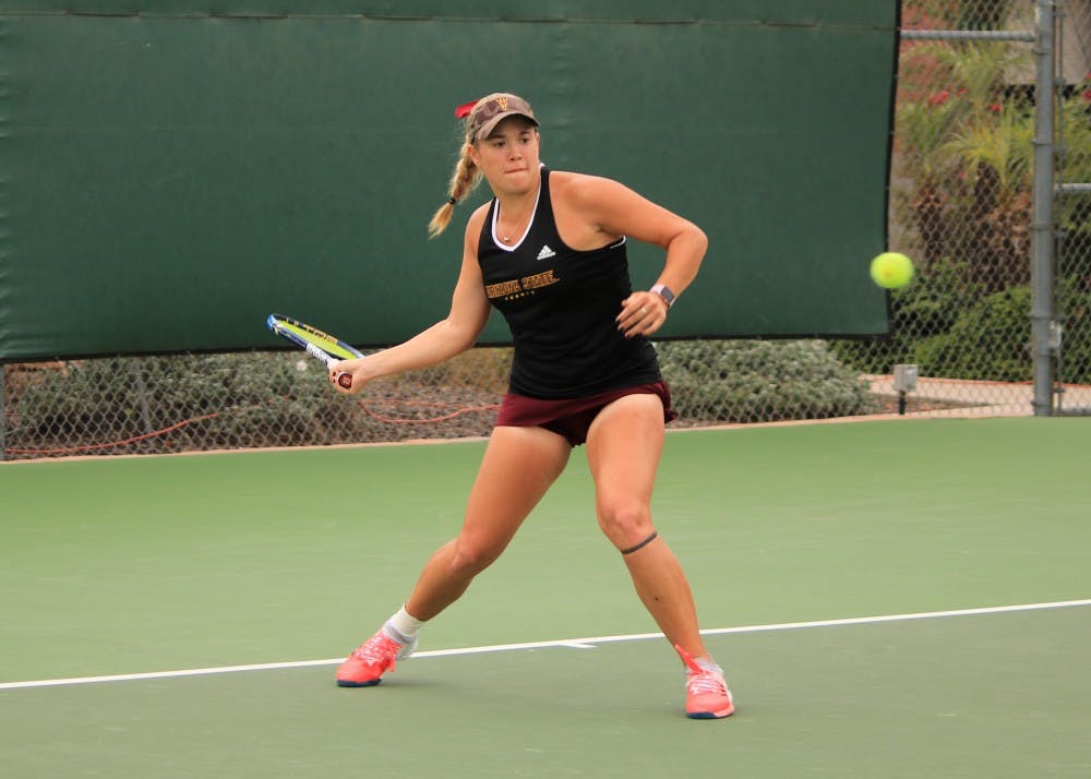 ASU senior tennis player Kassidy Jump competes in a singles match against Ohio State at Whiteman Tennis Center in Tempe, Arizona on Sunday, March 3, 2017.