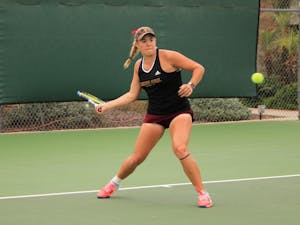 ASU senior tennis player Kassidy Jump competes in a singles match against Ohio State at Whiteman Tennis Center in Tempe, Arizona on Sunday, March 3, 2017.