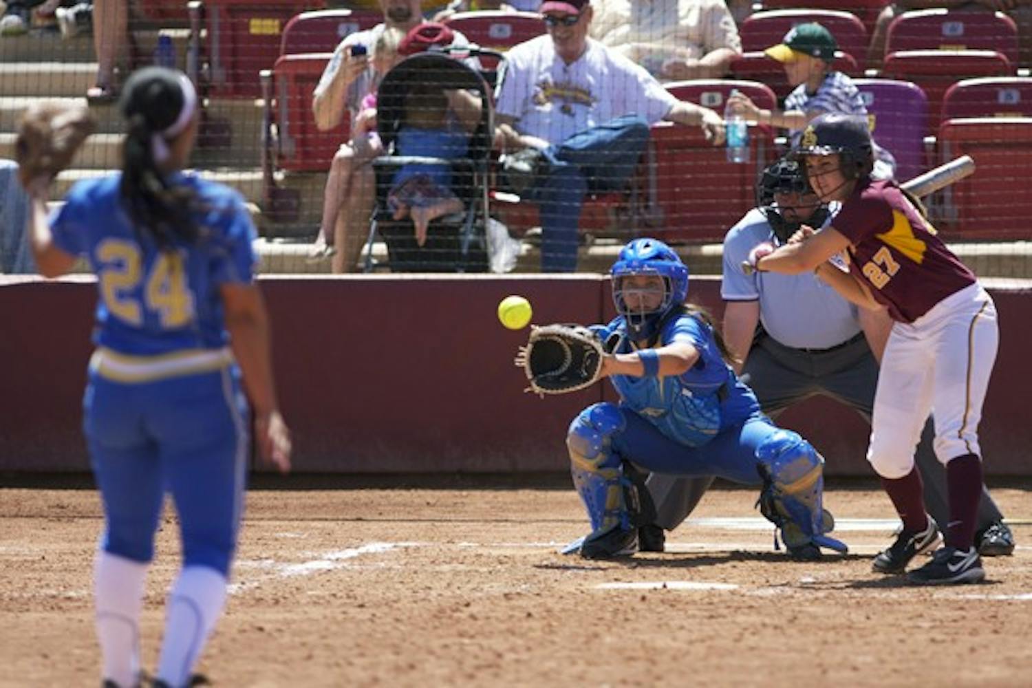 Still on Top: ASU senior catcher Kaylyn Castillo prepares to smack a pitch from UCLA junior pitcher Macon Aleah on Sunday in Tempe. The Sun Devils moved down one spot in the national rankings to No. 2, but still remain the top team in the Pac-10. (Photo by Scott Stuk)