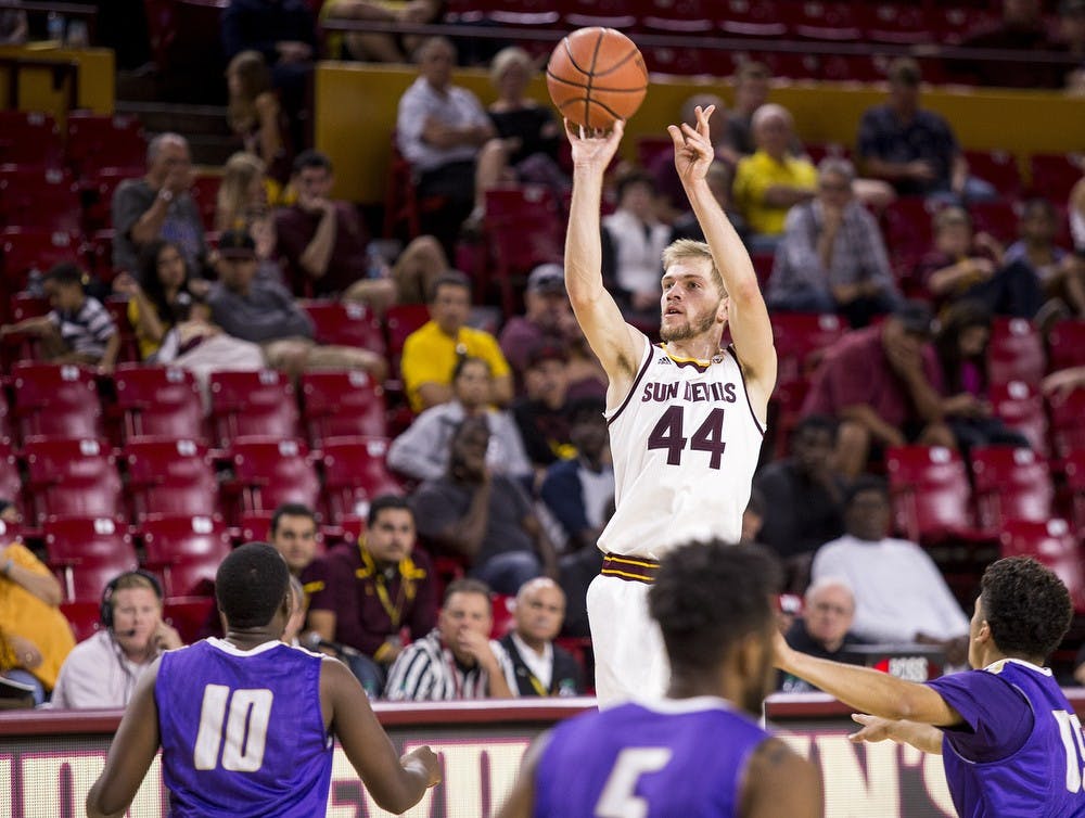 Sophomore guard Kodi Justice shoots during an exhibition game at Wells Fargo Arena in Tempe on Saturday, Nov. 7, 2015. The Sun Devils defeated Western New Mexico 102-34.
