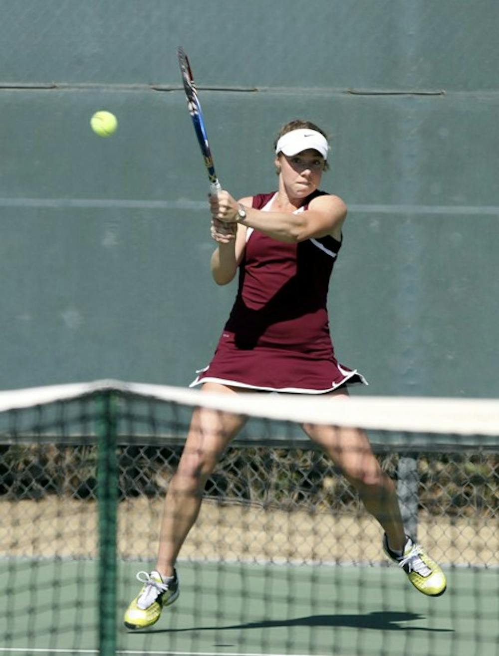 Junior Hannah James returns a volley in a match against NAU on Feb. 17. James started things off right for the Sun Devils, winning her singles match 6–0, 6–3. (Photo by Sam Rosenbaum)