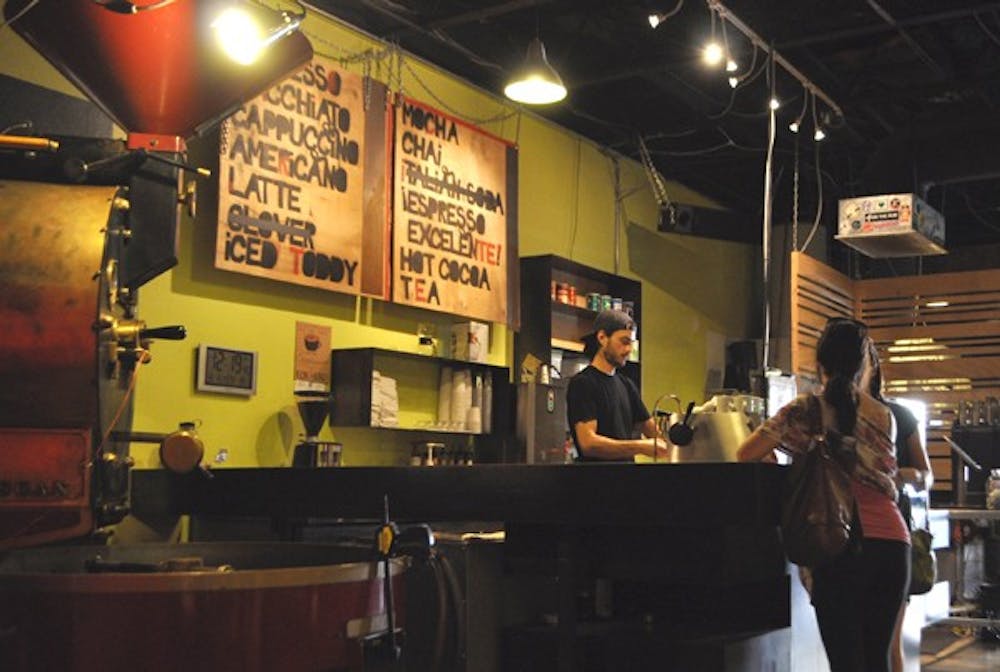 Customers order drinks at Cartel Coffee Lab in Tempe, located next to the proposed location for Cartel's microbrewery. (Photo by Christopher Leone)