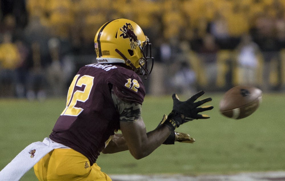 Redshirt junior wide receiver Tim White (12) catches a pass in the second quarter against Oregon on Thursday, Oct. 29, 2015, at Sun Devil Stadium in Tempe. 