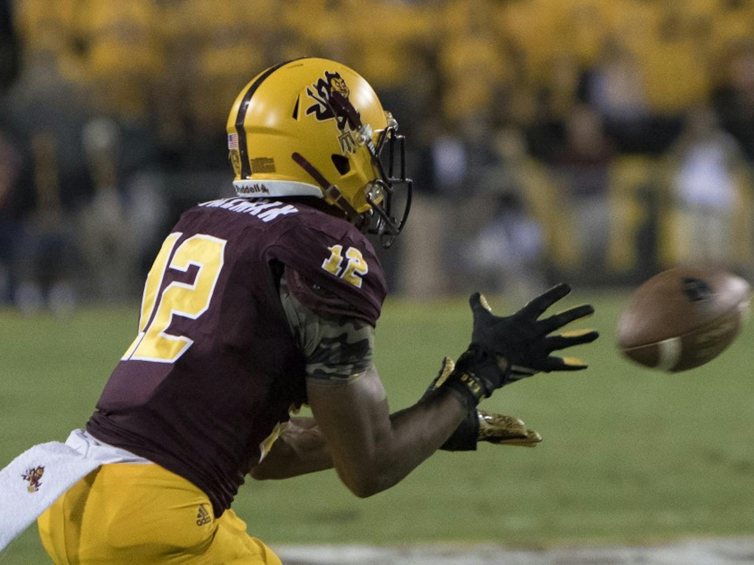 Redshirt junior wide receiver Tim White (12) catches a pass in the second quarter against Oregon on Thursday, Oct. 29, 2015, at Sun Devil Stadium in Tempe. 