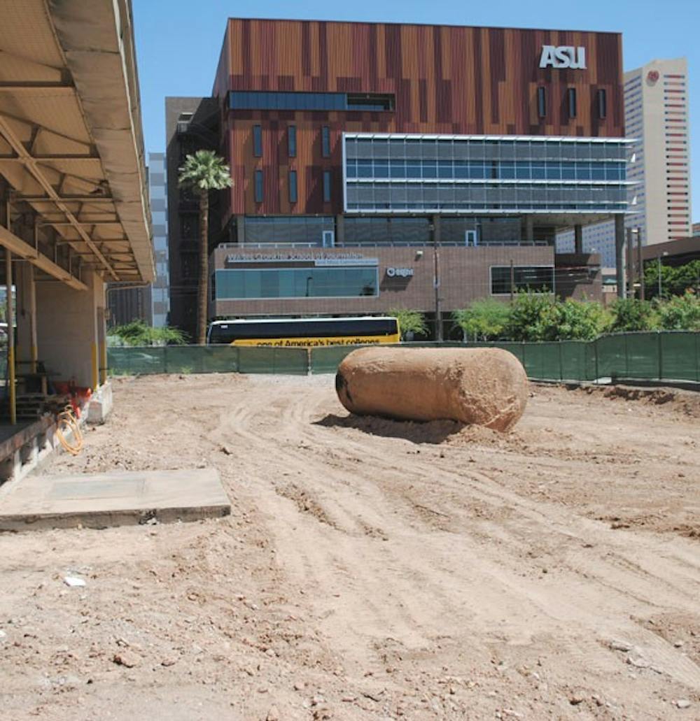 DOWNTOWN EXPANSION: A construction zone is seen across from the Cronkite School of Journalism and Mass Communication at the Downtown campus. ASU is planning on transforming the adjacent historic post office into a student union.  (Photo by Yvonne Gonzalez)