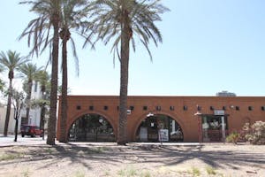EMPTY FOR A BIT LONGER: The empty lot where Dave's Doghouse used to be was planned to be a convention center for the city of Tempe. However, because of the uncertain economic times, the plans have been put on hold. (Photo by Nikolai de Vera)