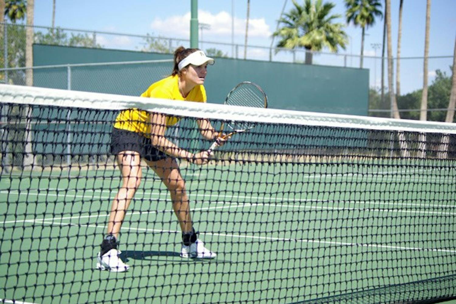 In the groove: ASU senior Ashlee Brown waits for the serve during doubles play against UC Irvine on Tuesday afternoon. The Sun Devils swept the Anteaters 7-0 for their third straight victory. (Photo by Nathan Meacham)