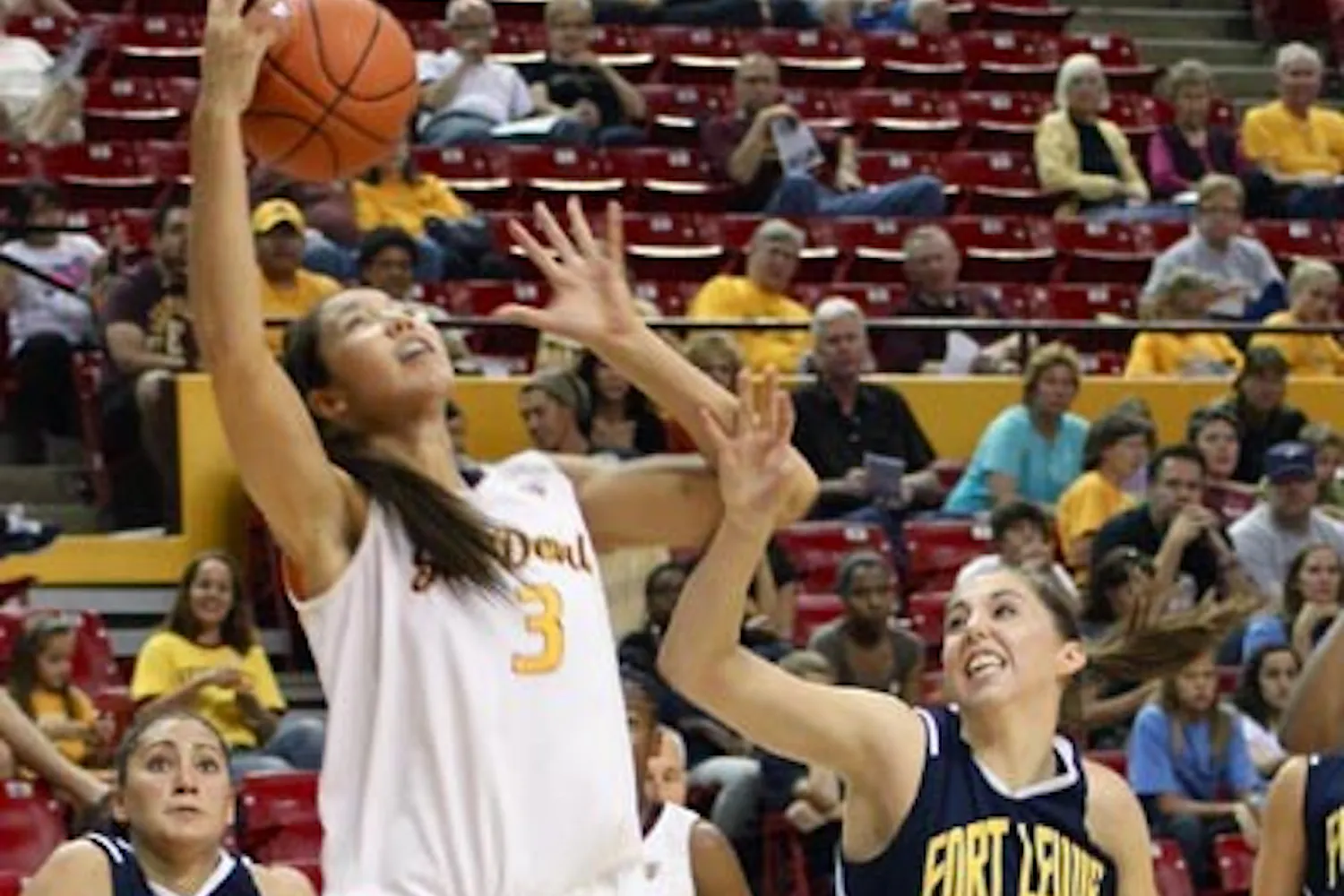 REBOUND HOUND: Sophomore forward/center Joy Burke pulls down a rebound against Fort Lewis in an exhibition game earlier this season. The ASU women's basketball team has put an increased focus on rebounding after two games. The Sun Devils take on No. 4 Tennessee in Knoxville on Sunday. (Photo by Rosie Gochnour)