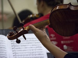 Violinist Senema Reinhardt rehearses with the ASU Chamber Orchestra under the direction of Cullan Lucas on November 14, 2016, in Tempe, AZ.
