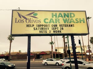 A sign advertises Whitford's campaign coming to volunteer at Los Olivos Hand Car Wash on Saturday, Sept. 26, 2015. 
